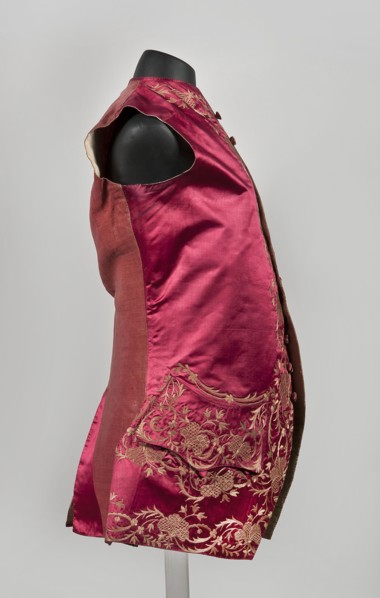 Men's vest made of cherry satin, embroidered. Straight cut, without sleeves or collar. Diagonal