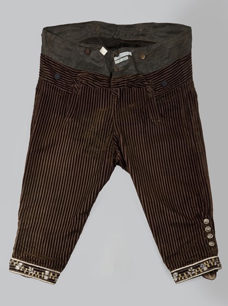 Trousers, short to the knee with a lapel, made of striped brown velvet; in the waist sewn into a
