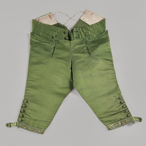 Trousers, short knee-length trousers with a flap, made of green silk fabric. Two small pockets