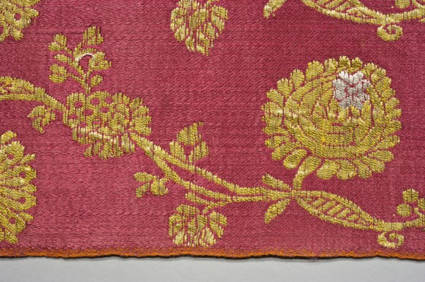 Fabric fragment, fragments of silk patterned fabric with plant motifs, indigo and brazilwood dyes.