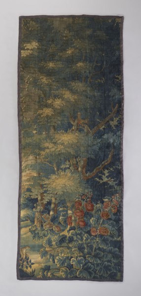 Fragment of verdure tapestry depicting flowers, leaves, floral ornaments, trees, birds, pastoral
