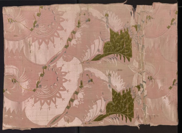 Fragment of pink silk brooch fabric with a fanciful and floral pattern in the Bizarr type.