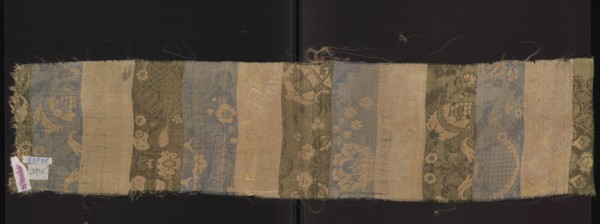 Fragment of fabric. Silk, one-sided damask with floral and lace motifs; background satin with warp