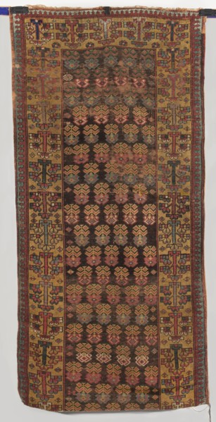 Carpet, gift; 18th century, Caucasus. Main field with floral branches arranged in alternating rows.