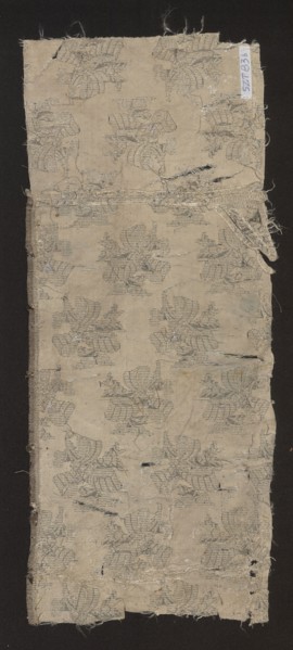 Fabric fragment, 17th century, France. Fragment of silk patterned fabric with preserved design: