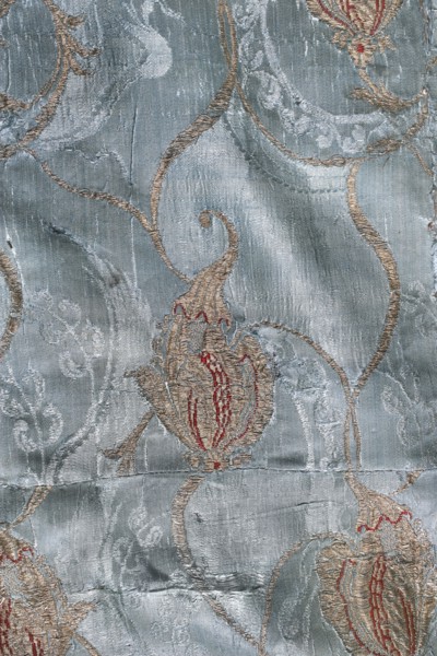 Fabric fragment, patterned silk fabrics, fragments of silk damask, pale blue ground brocaded with