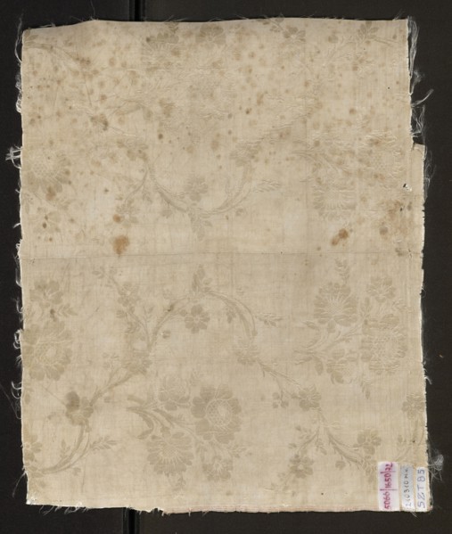 Fabric fragment, silk, patterned floral double-warp fabric. Cream and silver lamé with a pattern of