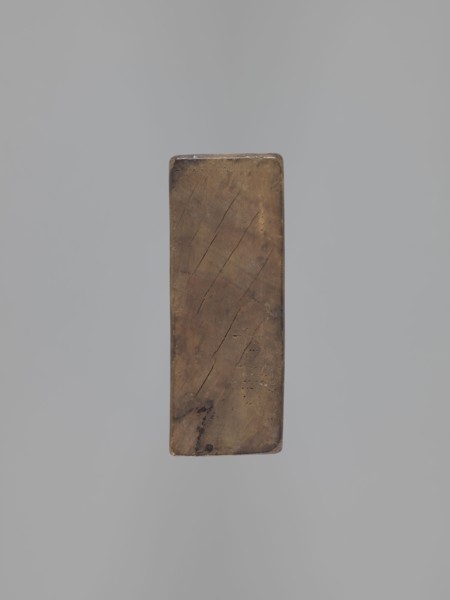 Double-sided gingerbread mould. Side A: bison; Side B: three figures — a bachelor in early