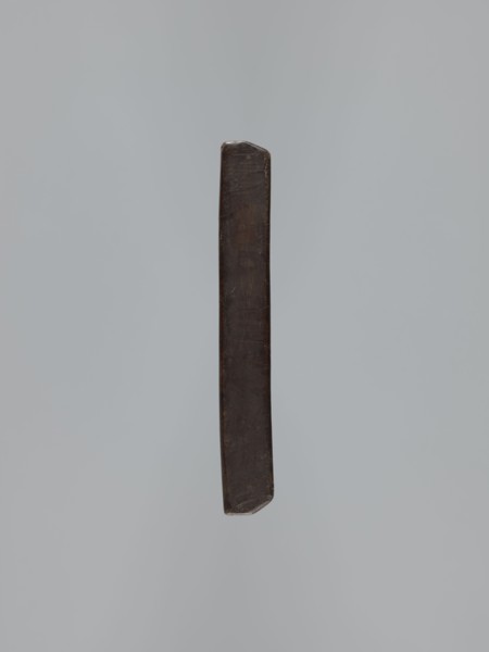 Double-sided gingerbread mould. Side A: female figure in a decorative bonnet and long patterned