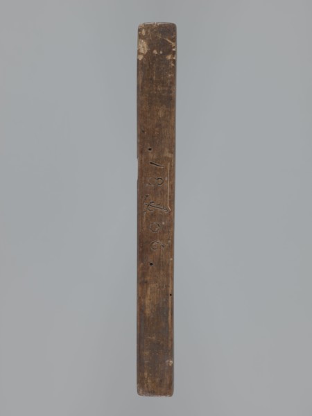 Double-sided gingerbread mould. Obverse: rectangular floral and geometric ornament; reverse: image