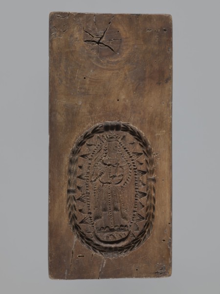 Double-sided gingerbread mould. Obverse: image of Madonna and Child. Reverse: small image of