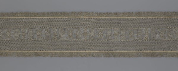 A so-called Saxon lace belt, lace belt as a men's clothing accessory. The central part is a