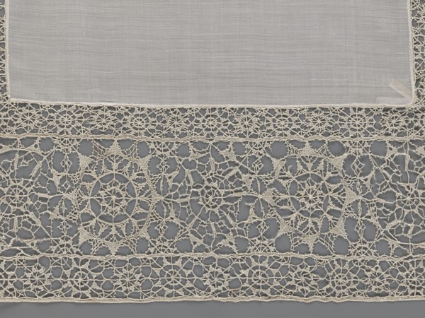 Doily, geometric ornaments, rosettes ornament, doily with smooth center. Edge made of white linen