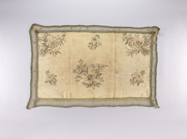 Wall hanging of rep fabric sewn from many fragments, embroidered with beige, cream, ash, and brown
