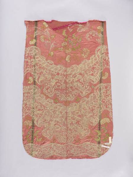 Back of a chasuble. Fragment of red amaranth satin fabric, embroidered; originally probably