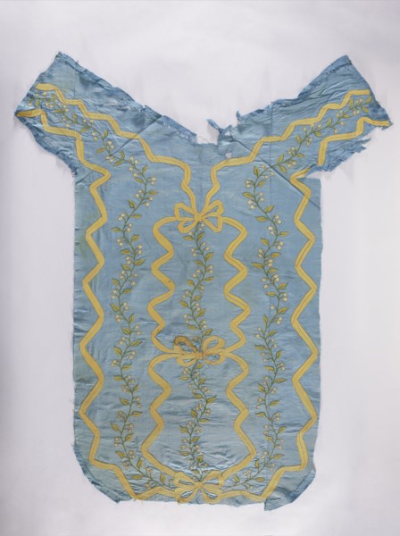 Back of a chasuble made of blue silk rep, embroidered with ribbon motifs tied in the center with