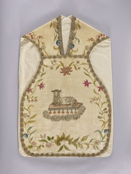 Chasuble, Front center: an embroidered lamb lies on a book from which seven seals emerge,