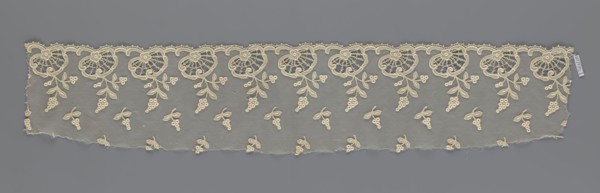 Fragment of lace, lace of, plant ornaments, slightly serrated lower edge with shell motifs and