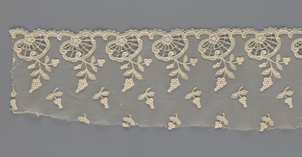 Fragment of lace, lace of, plant ornaments, slightly serrated lower edge with shell motifs and
