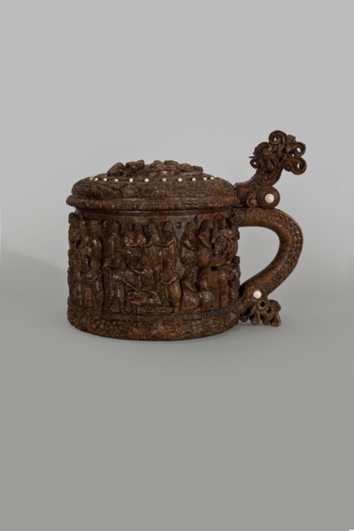 Wooden pear-shaped tankard, so-called peg tankard, carved, round, richly decorated with bas-reliefs