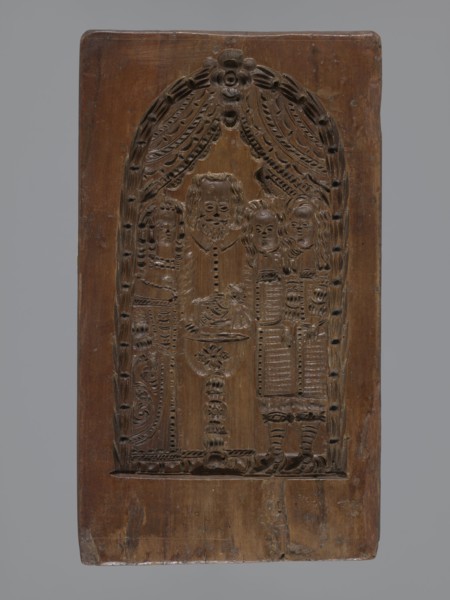 Double-sided gingerbread mould. Obverse: baptism scene; reverse: floral ornament. Genre scenes;