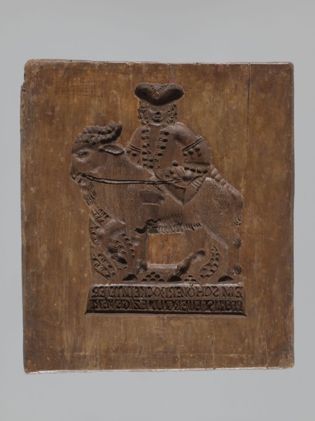 Double-sided gingerbread mould. Rectangular; obverse: man in 18th-century attire tricorn hat,