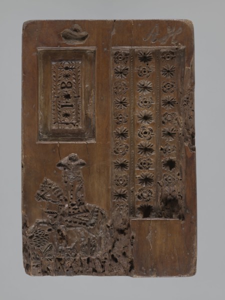 Double-sided gingerbread mould. Obverse: genre scene; reverse: three depictions. Double-sided