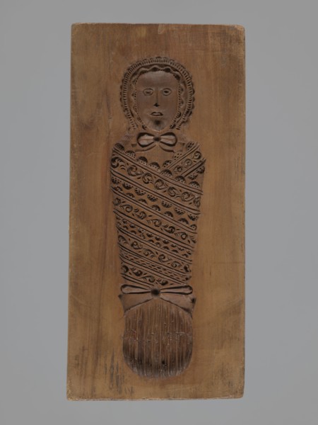 Double-sided gingerbread mould. Obverse: Adam and Eve in paradise; Reverse: baby in swaddling