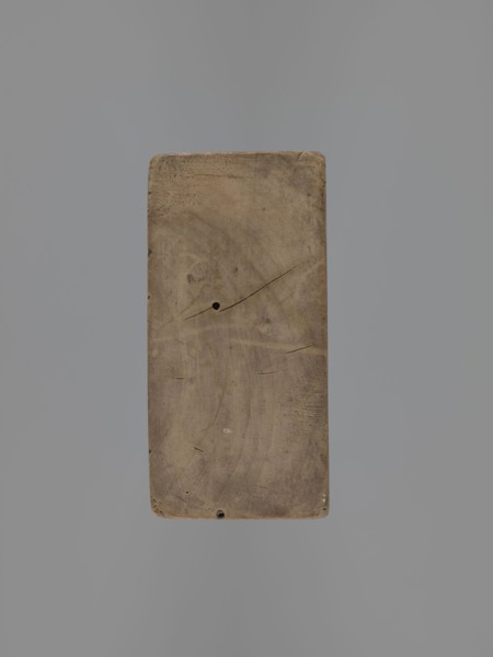 Double-sided gingerbread mold. Obverse: baby in swaddling clothes richly decorated with geometric