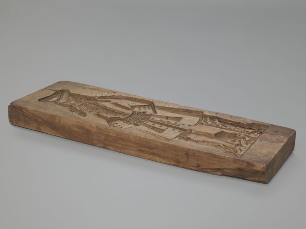 One-sided gingerbread mould with the image of a bachelor. One-sided rectangular mould showing a