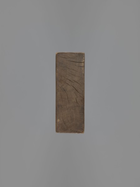 Double-sided gingerbread mould. Obverse: female figure in a long, patterned, richly decorated