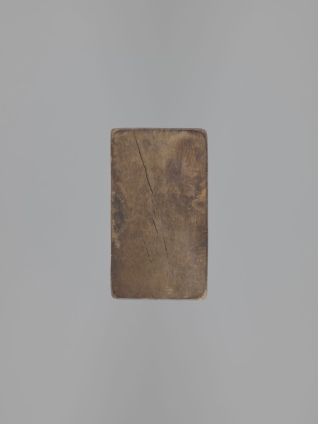 Double-sided gingerbread mould. Obverse: female figure in a long, patterned, richly decorated