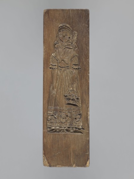 Double-sided gingerbread mold. Obverse: female figure; Reverse: baby in swaddling clothes.