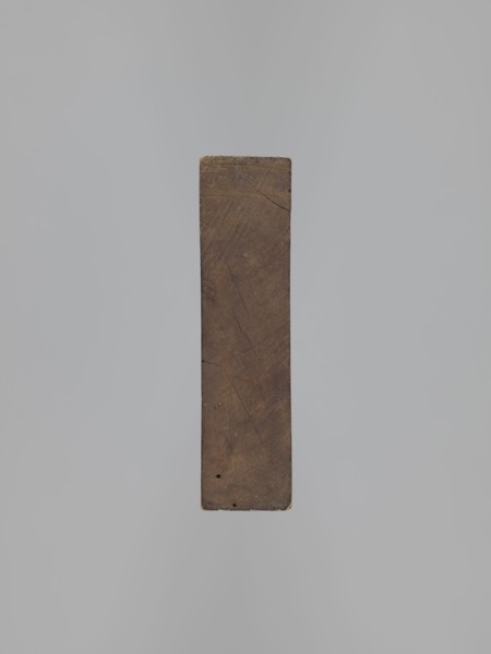 Double-sided gingerbread mould. Obverse: 16 images of various figures. Reverse: 12 depictions.