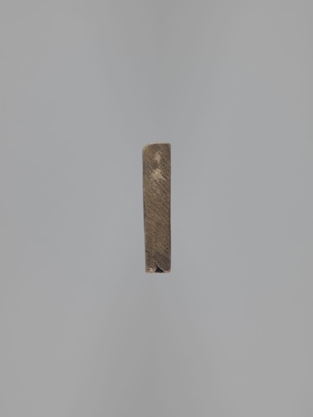 Double-sided gingerbread mould. Obverse: images of four heads; when the block is rotated the heads
