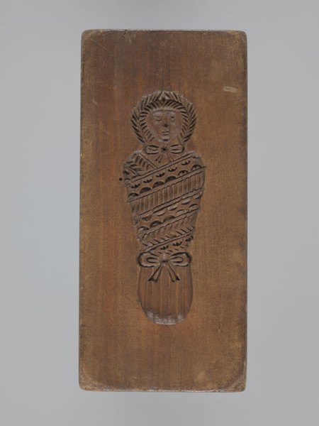 Double-sided gingerbread mold. Obverse: baby in swaddling; Reverse: baby in swaddling. Folk-style