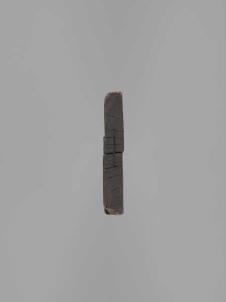 Double-sided gingerbread form. Obverse: figure of an angel with the alphabet. Reverse: various