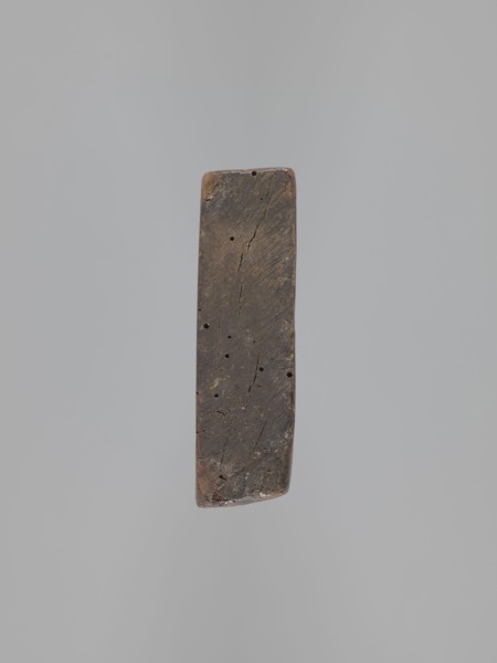 Double-sided gingerbread form. Obverse: image of Madonna and Child; figure of the Virgin Mary in a