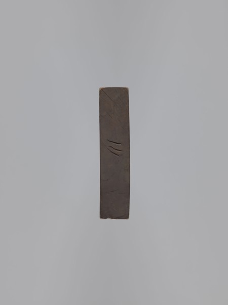 Double-sided gingerbread form. Obverse: male figure with a chalice in hand; reverse: baby in