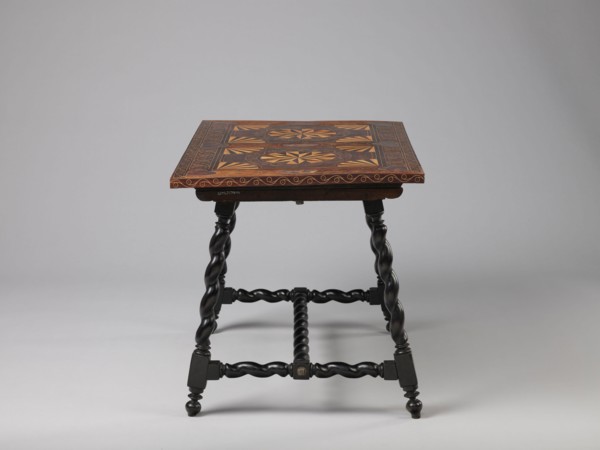 Table, geometric decorations, plant ornaments; rectangular table supported by four straight, spiral
