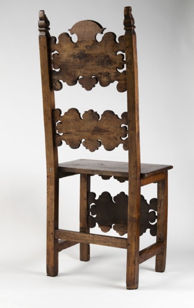 Chair, carved, reclaimed, volutes ornament, Renaissance style. CHAIR with a board seat and a high