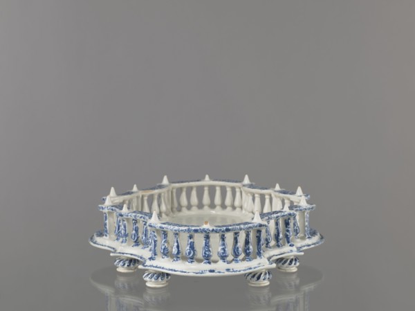 Base for a tabletop tray. Oval architectural tray serving as a base for a tabletop tray. Carved