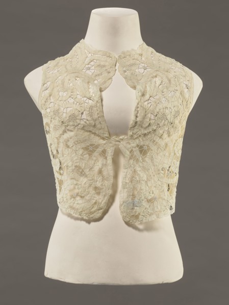 Bodice, lace;, Pattern of rosettes connected by large spiders and heads; pattern of stylized floral