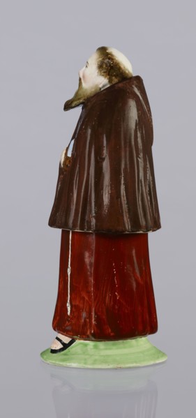 Three-part inkwell in the form of a monk figurine. Consisting of three movable parts: a movable