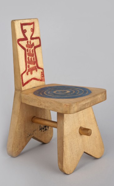 A stool-type chair from a set of doll furniture with painted decoration on the backrest schematic