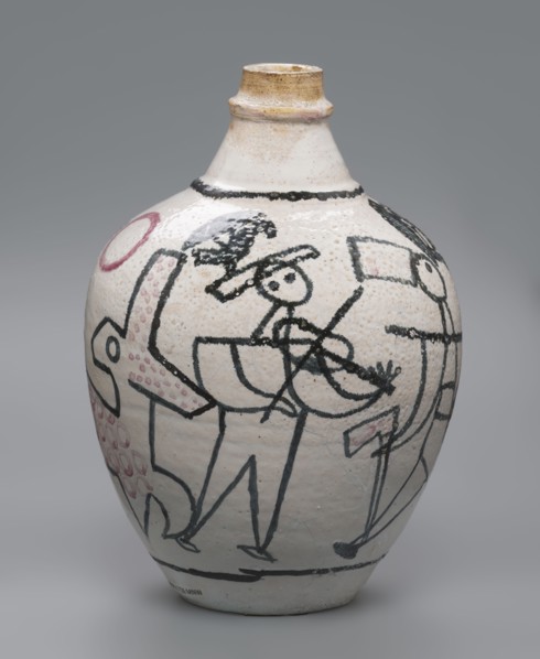A painted ceramic jug with a handle, decorated with stylized figures of people robbers and