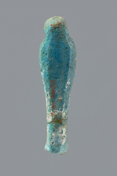 Ushabti, mummy-shaped funerary figurine wrapped in a shroud with its arms crossed on its chest,