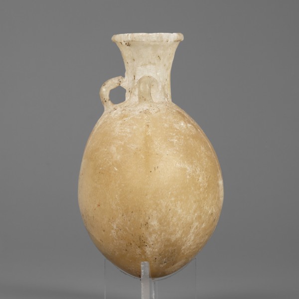 Flask-shaped vessel with a spherical, flattened belly, narrow widening neck and three small