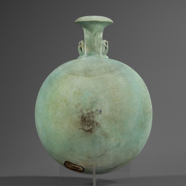 New Year's canteen, Flat round faience canteen with a narrow short neck ending in a chipped spout