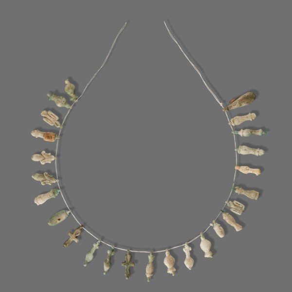 Fragment of a necklace of amulets 26 pieces, Goluchów Greater Poland Voivodeship, necklaces, grave